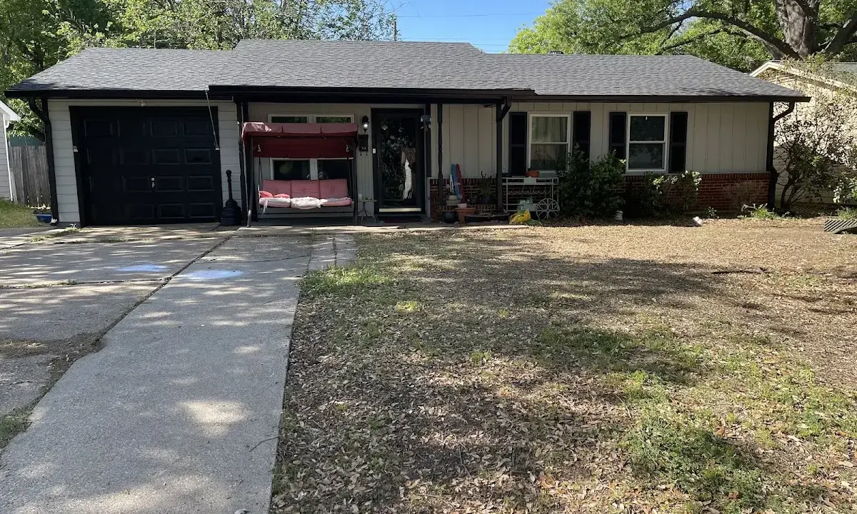 Asphalt Shingle Roof Repair crew at work on a residential roof in Ocean